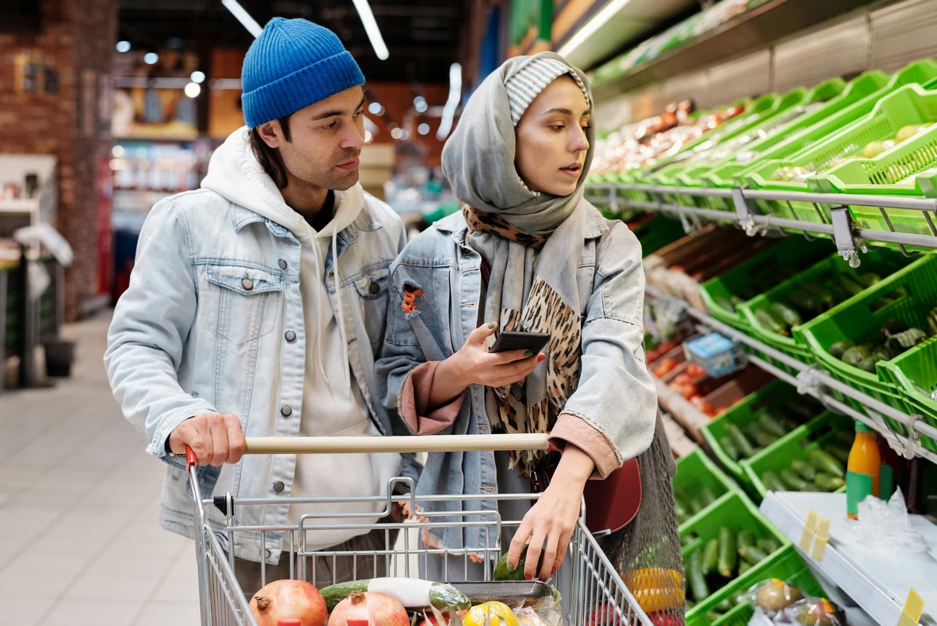 Shoppers at a fresh produce market stall